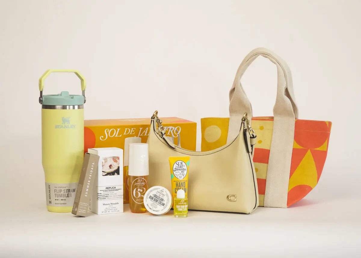 The image shows a collection of beauty and lifestyle products, including a water bottle, various skincare items, a handbag, and a tote bag, arranged on a white surface