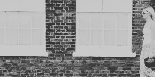 GIF of a girl carrying a Bottega Veneta Jodie Mini.